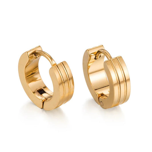 A pair of gold-plated hoop earrings with a grooved or ridged design.