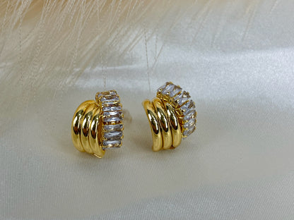 Gold vintage knot earrings with sparkling cubic zirconia stones.