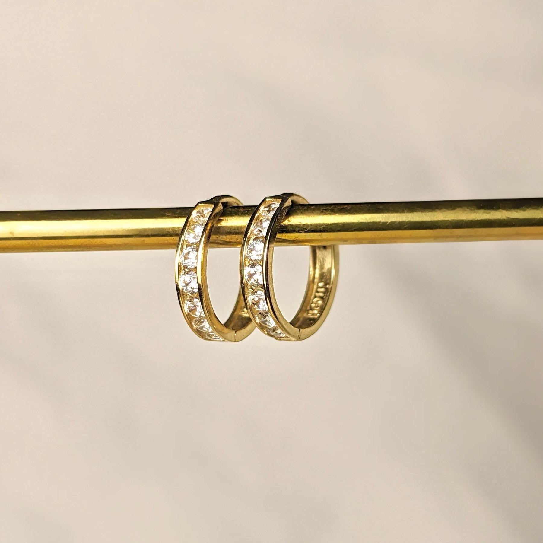 14k yellow gold with cubic zirconia diamonds